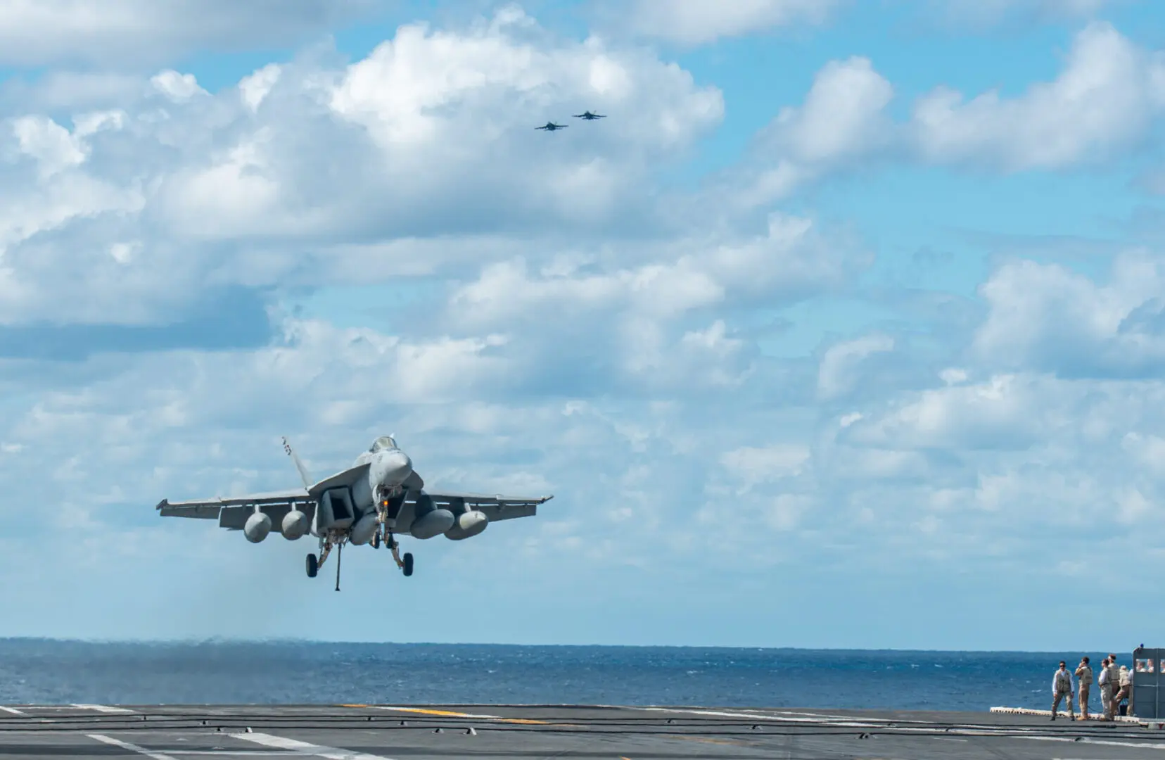 SEA OF JAPAN (Oct. 6, 2022) An F/A-18E Super Hornet, attached to the ÒRoyal MacesÓ of Strike Fighter Squadron (VFA) 27, lands on the flight deck of the U.S. NavyÕs only forward-deployed aircraft carrier, USS Ronald Reagan (CVN 76), in the Sea of Japan. The Royal Maces conduct carrier-based air strikes and strike force escort missions, as well as ship, battle group, and intelligence collection operations. Ronald Reagan, the flagship of Carrier Strike Group 5, provides a combat-ready force that protects and defends the United States, and supports alliances, partnerships and collective maritime interests in the Indo-Pacific region. (U.S. Navy Photo by Mass Communication Specialist 2nd Class Michael B. Jarmiolowski)