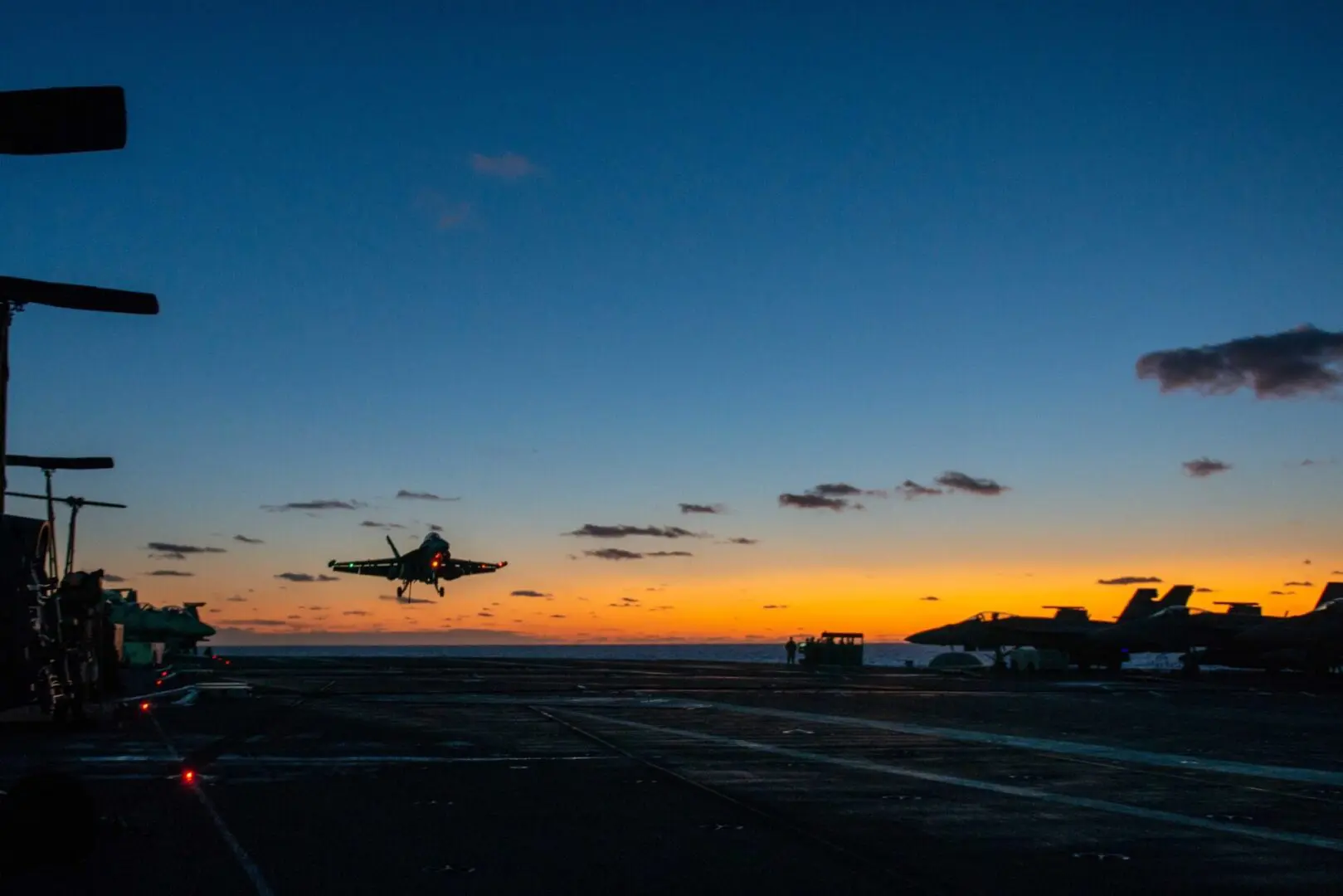 SEA OF JAPAN (Oct. 5, 2022) An F/A-18F Super Hornet, attached to the “Diamondbacks” of Strike Fighter Squadron (VFA) 102, descends for a landing on the flight deck of the U.S. Navy’s only forward-deployed aircraft carrier, USS Ronald Reagan (CVN 76), in the Sea of Japan. The Diamondbacks conduct carrier-based air strikes and strike force escort missions, as well as ship, battle group, and intelligence collection operations. Ronald Reagan, the flagship of Carrier Strike Group 5, provides a combat-ready force that protects and defends the United States, and supports alliances, partnerships and collective maritime interests in the Indo-Pacific region. (U.S. Navy photo by Mass Communication Specialist 2nd Class Michael B. Jarmiolowski)