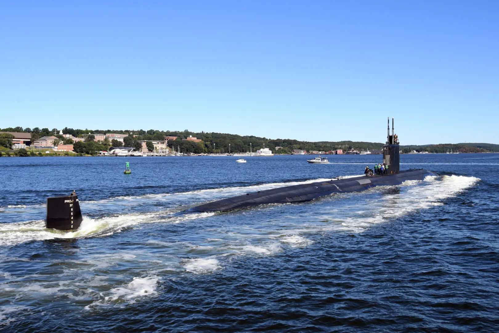 GROTON, Conn. (Sept. 2, 2022) The Los Angeles-class submarine USS San Juan (SSN 751) transits the Thames River as the boat returns from routine operations to Naval Submarine Base New London in Groton, Conn. San Juan and crew operate under Submarine Squadron (SUBRON) TWELVE and its primary mission is to provide attack submarines that are ready, willing, and able to meet the unique challenges of undersea combat and deployed operations in unforgiving environments across the globe. (U.S. Navy photo by Chief Mass Communication Specialist Joshua Karsten)